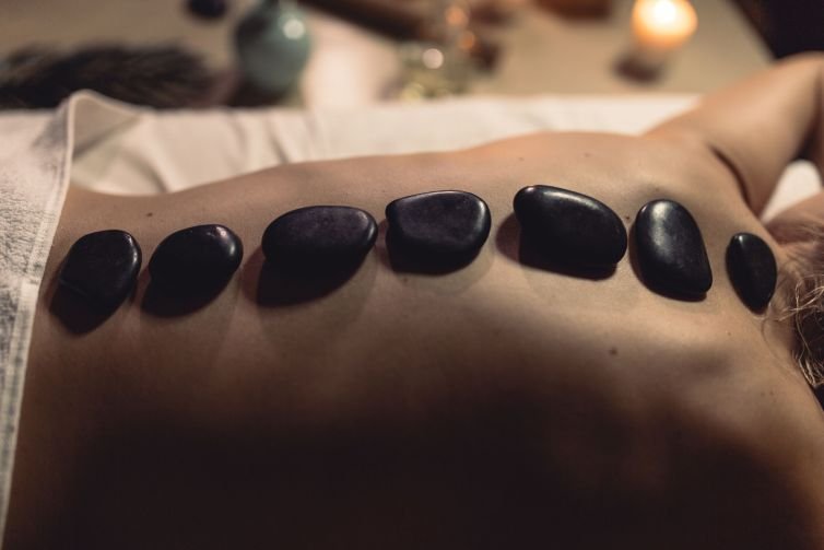 spa-concept-with-woman-stones
